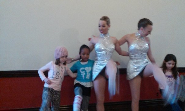 My 8-year old daughter Kameko (in stripped leg-warmers) learns how to strut and kick  with the glamorous Rockettes 