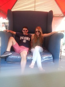 Megan and Steve werer having a blast at the food festival . Even taking pics iin the oversized chair